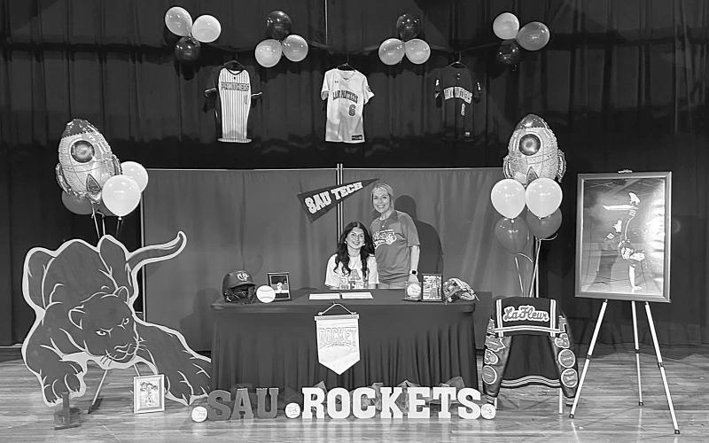 Camron Lafleur is pictured on the left with head Pine Prairie softball coach Alycia Hebert. Lafleur recently signed to play softball with SAU Tech. (Photo courtesy of Pine Prairie High School Softball)