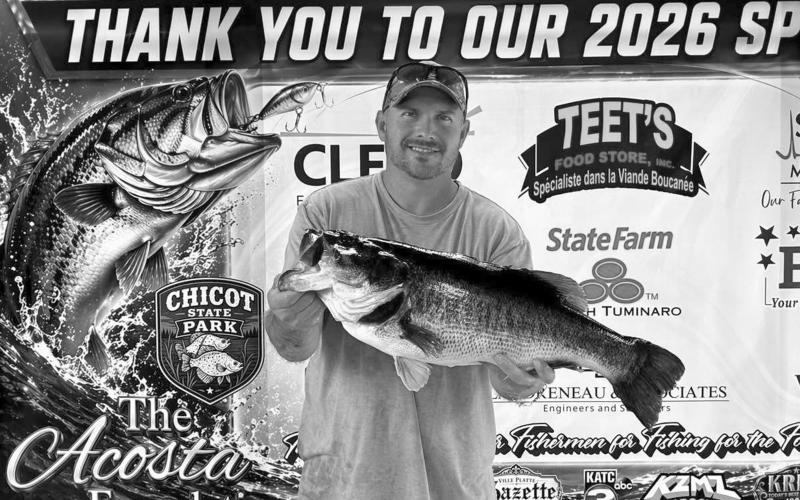 Keith Carmouche took home the ‘Big Bass’ title. He is pictured here with his incredible 10.45-lb catch at Chicot State Park. (Photo courtesy of Chris Lamke)