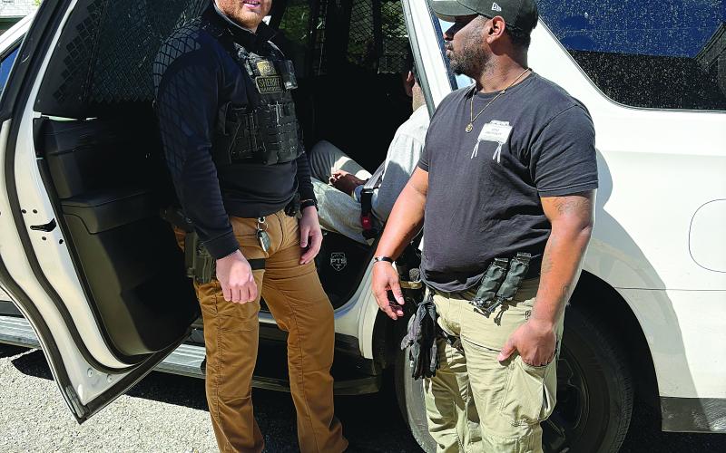 Deputies with the Criminal Patrol Unit of the Evangeline Parish Sheriff’s Office escort Trae’land Castille, 19, of Arnaudville, out of a police unit and into the Evangeline Parish Courthouse for his initial court hearing on Monday, March 17. His arraignment date is set for Monday, May 5, in Division A. (Photo courtesy of EPSO)