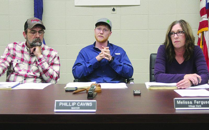 Phillip Cavins (center) presides over his final meeting as mayor of Turkey Creek on Tuesday, January 17. Cavins will be replaced by newly elected Bert Keith Campbell, who will take office on Tuesday, January 24. Also pictured are Councilman Eric Chapelle (left) and Village Clerk Melissa Ferguson (right). (Gazette photo by Tony Marks)