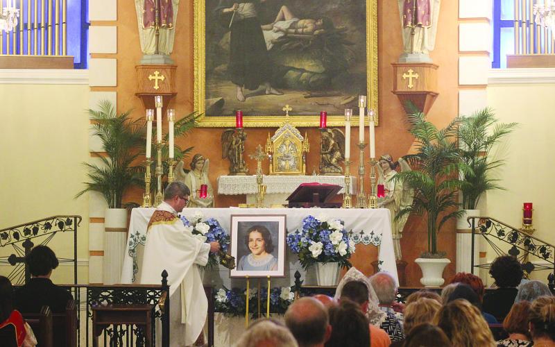 Fr. Josh Guillory is pictured above as he incenses around the altar during the 67th Anniversary Mass honoring Servant of God Charlene Richard. The Mass was held Tuesday, August 11, at St. Edward Catholic Church, in Richard. (Gazette photo by Tony Marks)