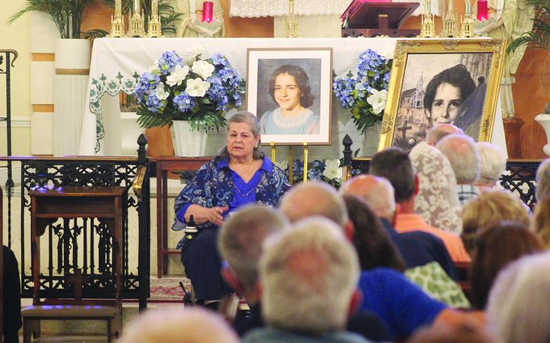 Jean Marcantel provides a testimony of a healing that is credited to Charlene Richard. (Gazette photo by Tony Marks)