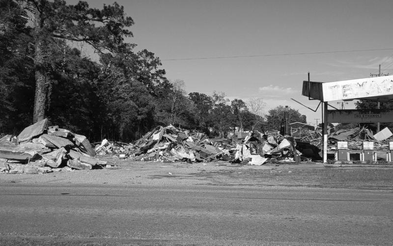 THIS YEAR - This picture was taken on the afternoon of Tuesday, April 7, after the demolition crew brought the old City Cash structure down.