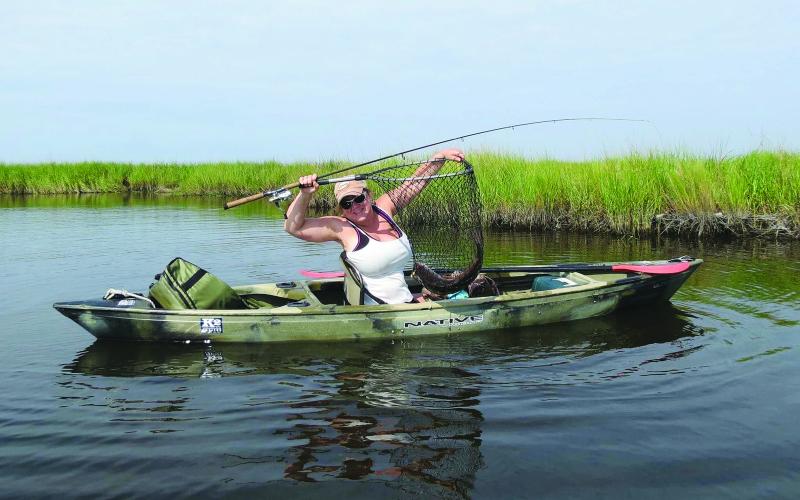 While leading the Cajun Sportsman publication in Houma, Olivier fished out of lower Lafourche Parish many times, including this kayak trip on a private lease in the marshes near Leeville. On this trip, she fished with a group of anglers from Team Hooked on Yak. (Photo courtesy of Claudette Olivier)