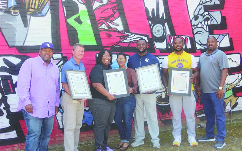 Basketball coaches receive proclamations