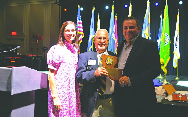 FRIEND OF THE VVA - Cody and Louise Vidrine were presented the Friend of the VVA (Vietnam Veterans of America) award for Chapter #632 in Ville Platte by President JD Soileau (center).