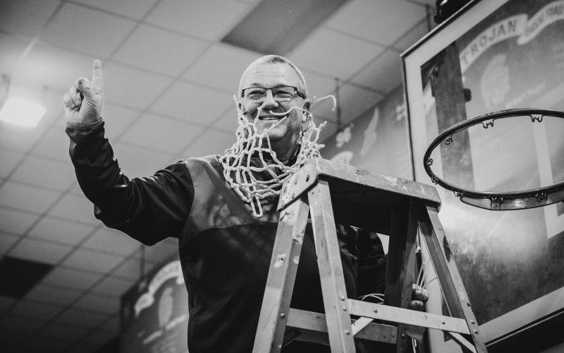 Craig Whittington is pictured as he cuts down the net during his team’s run to its first state tournament appearance. (Photo courtesy of Craig Whittington))