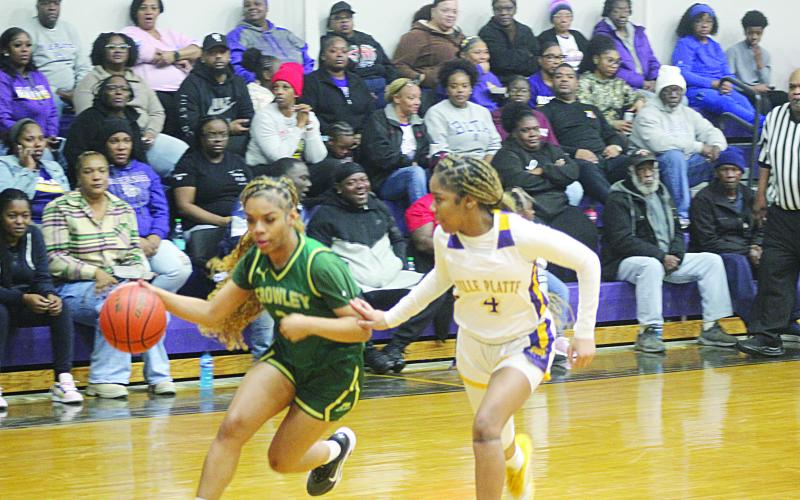 Janiah Leday (4) scored 22 points against Crowley to go over 1 thousand points in her career. (Gazette photo by Tony Marks)