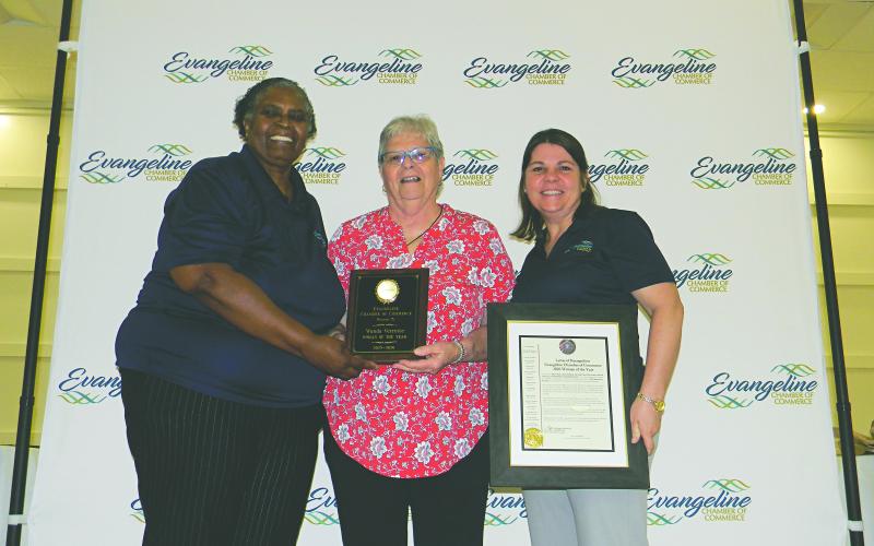 WOMAN OF THE YEAR - Wanda Verrette (center) was named Woman of the Year. She is shown with Linda Fontenot (left) and Kristi Enicke (right). (Gazette photos by Heather Bogard)