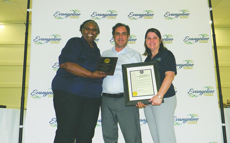 MAN OF THE YEAR - Pastor Steven Sawtelle with Hundredfold Coffee (center) was named Man of the Year. He is shown with Linda Fontenot (left) and Kristi Enicke (right). (Gazette photos by Heather Bogard)