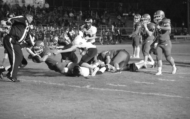 Ashton Deaville (26) dives across the goal line for Basile touchdown in the Bearcats’ homecoming win against Merryville that gave them at least a share of the district championship. (Photo courtesy of Tonya Ortego)