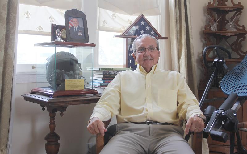 Ben Soileau is pictured sitting in his home office along side items collected during his career in the Air Force. (Gazette photo by Tony Marks)