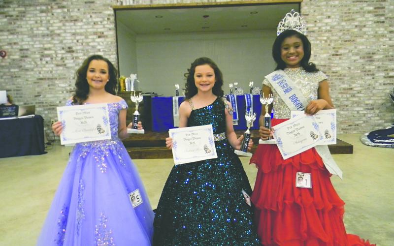 DEB MISS COURT - Shown, from left, are the members of the Deb Miss Boggy Bayou Court. They are Harleigh Credeur, second alternate; Elizabeth Reed, first alternate; and Queen Ava Claire Thomas.