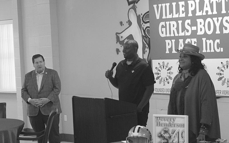 Former LSU and New Orleans Saints receiver Devery Henderson (center) spoke to the Ville Platte Girls-Boys Place Friday. Henderson touched on the importance of positive influences, hard work and interacted with the children while accompanying Louisiana Lt. Gov. Billy Nungesser (left). Also pictured is Ville Platte Mayor Jennifer Vidrine (right). (Gazette photo by Rhett Manuel)