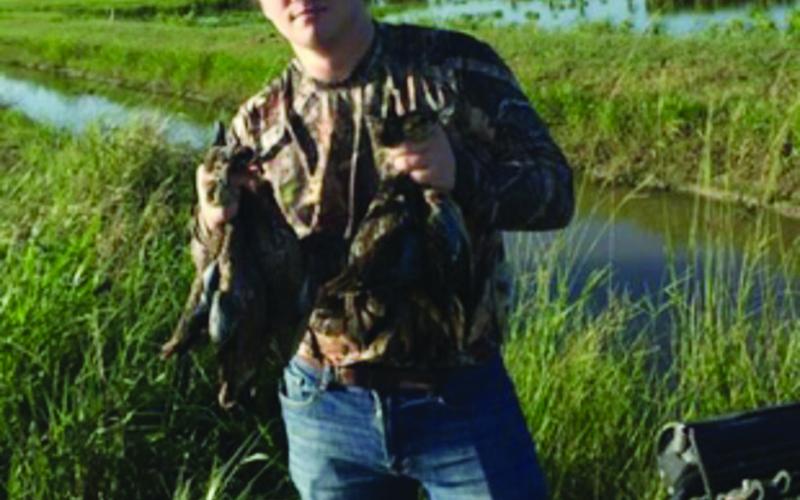 Recent Sacred Heart graduate Dylan McKay is pictured with ducks he killed while on a recent hunt near Miller’s Lake. (Photo courtesy of Dylan McKay)