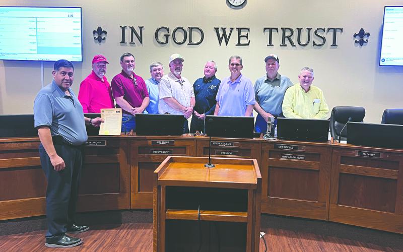 During the March 2, meeting of the Evangeline Parish Police Jury, the jury proclaimed the month of March as American Red Cross Month. Shown, from left, are Chris LeDee (Acadian Ambulance Community Relations Supervisor), jurors Bryan Vidrine, Ryan Ardoin (vice president), Tim Causey, Keith Saucier, Brent Guillory, Kevin Veillon (president), Sidney Fontenot and Dirk Deville (secretary/treasurer). (Gazette photo by Nancy Duplechain)