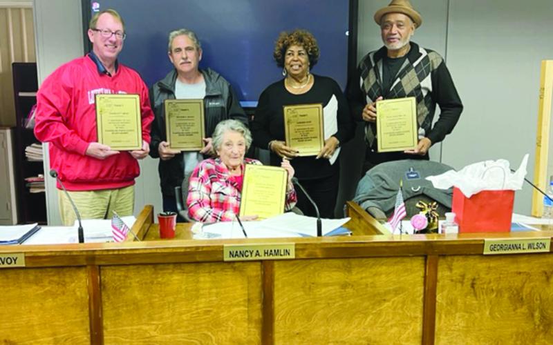 Standing from left are Scott Limoges, Arthur Savoy, Georgianna Wilson, and Ellis Guillory Sr.; sitting is Nancy Hamlin. Pictured in the inset photo is Peggy Forman. (Gazette photos by Tony Marks and courtesy of EPSB)