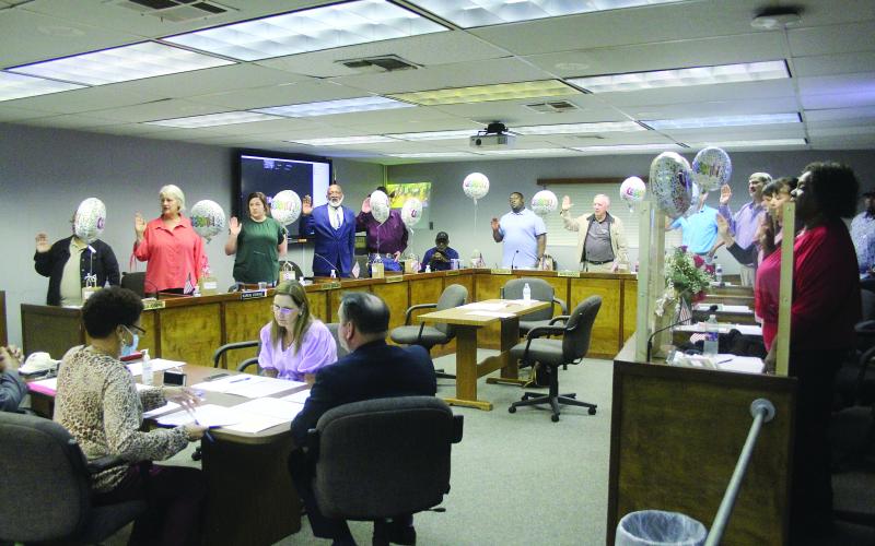 Standing from left are Sheila Joseph, District 7; Karen Vidrine, District 3; Kristy Briley, District 9; Donald Anderson, District 13; Lonnie Sonnier, District 1; Calvin Leday Jr., District 12; Wayne Dardeau, District 4; Nick Chaumont, District 2; Mike Fontenot, District 6; Bobby Hamlin, District 11; Fannie Soileau, District 10; Monica Andrus, District 5; and Wanda Skinner, District 8. (Gazette photo by Tony Marks)