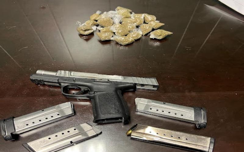 Pictured are a firearm, illegal narcotics, and other items seized after recent arrests made by the Evangeline Parish Sheriff’s Office. (Photo courtesy of EPSO)