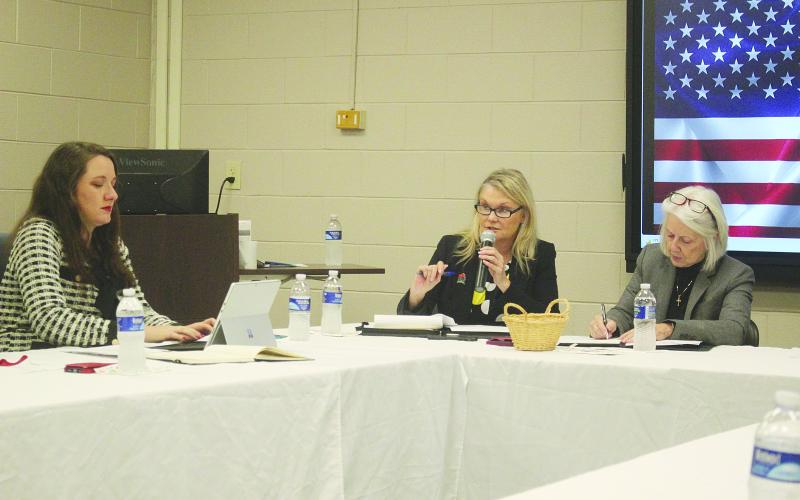Newly elected president of the Evangeline Economic Development Authority, Opal Andrus, is pictured in the center as she presides over the inaugural meeting on Monday, December 16. Also pictured are newly elected secretary, Raquel Manuel on the left and Acting Secretary Dr. Gwen Fontenot on the right. (Gazette photo by Tony Marks)