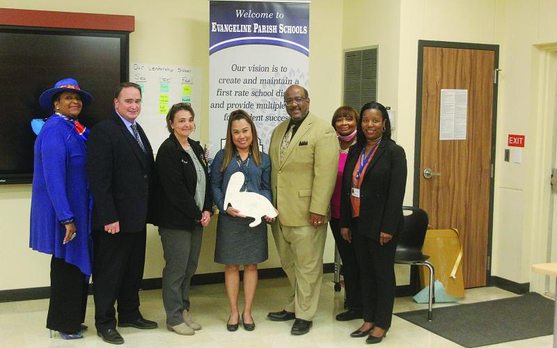 Ville Platte High School teacher Emee Aswell was named Louisiana Department of Education high school teacher of the year semifinalists. From left are Ville Platte Mayor Jennifer Vidrine, Assistant Superintendent Mike Lombas, Special Education Supervisor Kelli LaFleur, Aswell, Superintendent Darwan Lazard, Teacher of the Year Coordinator Grace Sibley, and VPHS Principal Chenile Tezeno. (Gazette photo by Tony Marks)