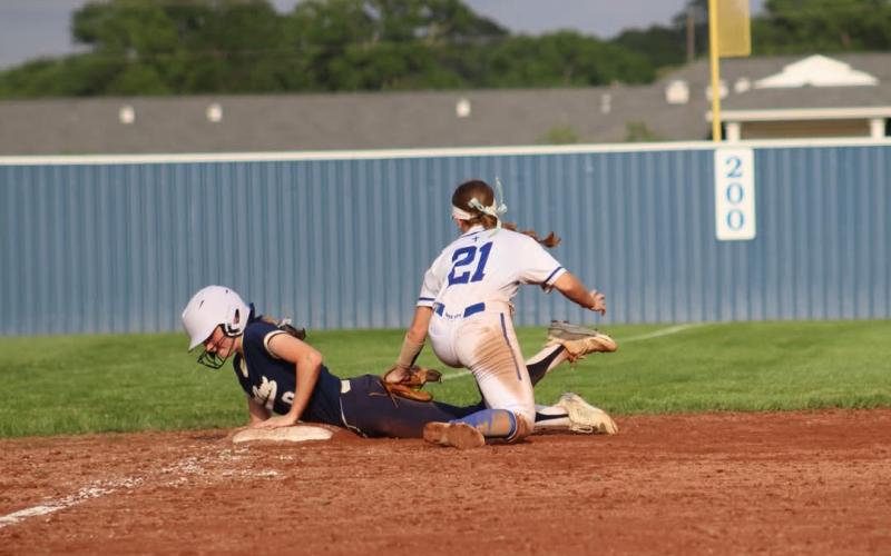 Sacred Heart’s Maci Droddy slides safely into third during Tuesday’s 5-2 win over St. Ed’s in District 5-1A play. (LSN photo by Rhett Manuel)