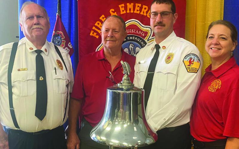 SUPPORTING FUSILIER - Three local firefighters were in attendance at Kyle Fusilier’s graduation ceremony from LFETA. Pictured (left to right) are Acadia-Evangeline Fire District Fire Chief Greg Savoy, Mike Putnam of the Basile Volunteer Fire Department and father-in-law of the graduate; Fusilier; and Heather Putnam-Lantz, member of the Basile Fire Department, the Basile Town Clerk, and sister-in-law of Fusilier.