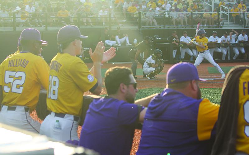 This picture of Devin Fontenot (28) cheering on the LSU Tigers from the dugout during a game against Southern Miss in the 2022 Hattiesburg Regional earned Ville Platte Gazette editor Tony Marks an honorable mention award for College-Pro Photography in the Louisiana Sports Writers Association Annual Contest. (LSN photo by Tony Marks)