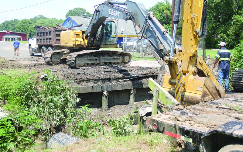 Pictured is work being done on Freddie Dunn Street, in Ville Platte, where a new bridge is being installed. The work began on Monday, June 5, and was expected to last three or four days. (Gazette photo by Tony Marks)