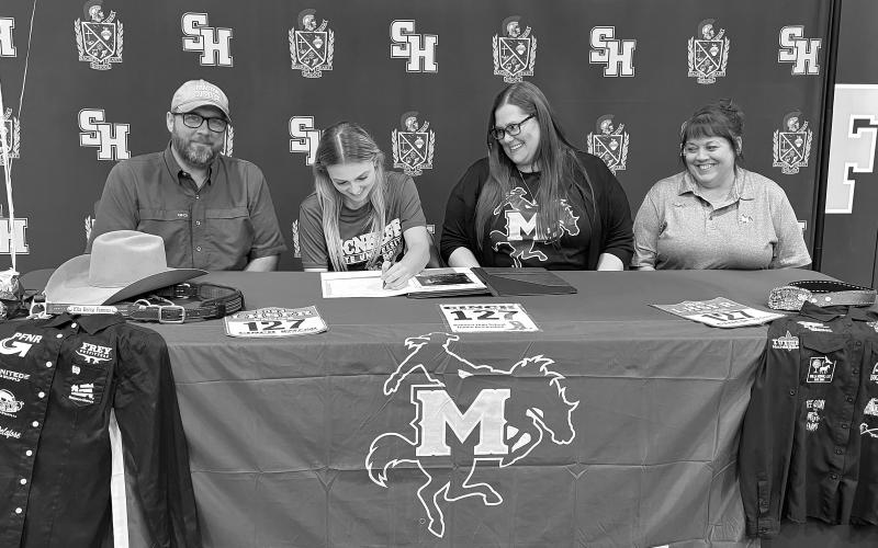 Pictured from left are Doug Fruge; Sidney Fruge, a Sacred Heart student who signed with the McNeese rodeo team; Rebecca Fruge, and Sacred Heart Rodeo Coach Stephanie Fontenot. (Gazette photo by Heather Bogard)