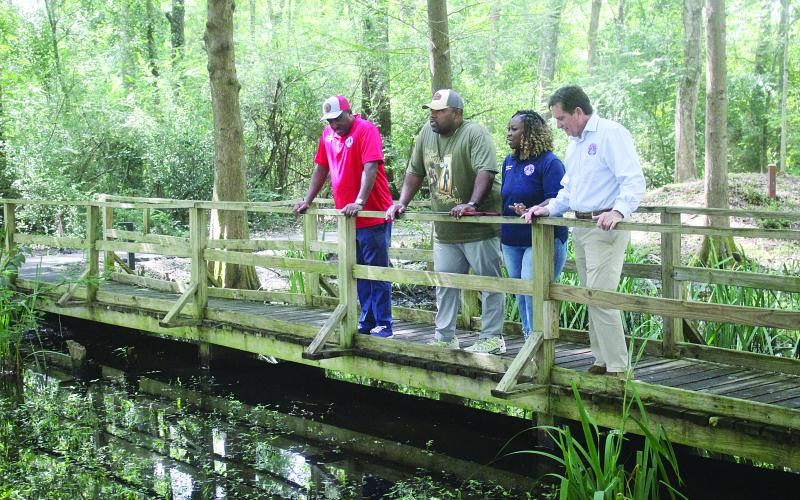 Ribbon cutting is held at Native Plant and Heritage Garden