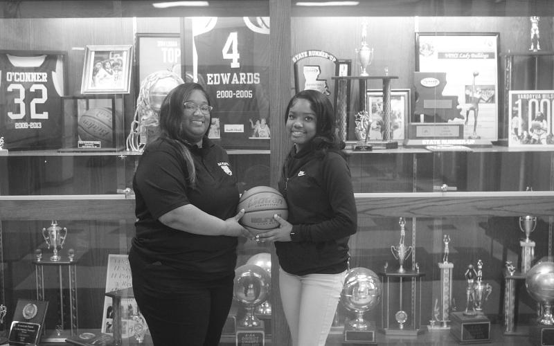 The 2026 Ville Platte Gazette’s Most Valuable Player and Coach of the Year for girls’ basketball represent Ville Platte High School. Above, left to right, are head coach of the Lady Bulldogs Rhonda Thomas and junior player Janiah Leday. Leday was one of five players in the parish to score over 1,000 points in her career this season  and helped guide the team to a state semi-final appearance. (Gazette photos by Tony Marks)