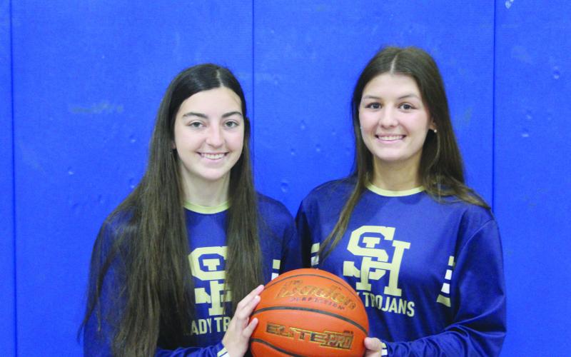 Breanna Ardoin (left) and Kali Shiver (right) were named Evangeline Parish’s Co-Most Valuable Players in girls’ basketball after helping lead their Sacred Heart Lady Trojan team to a state tournament appearance at Southeastern Louisiana University in Hammond. (Gazette photo by Rhett Manuel)