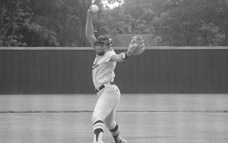 Amelia Fontenot (8) delivers a pitch in Sacred Heart’s playoff loss to Glenbrook. (Gazette photo by Tony Marks)
