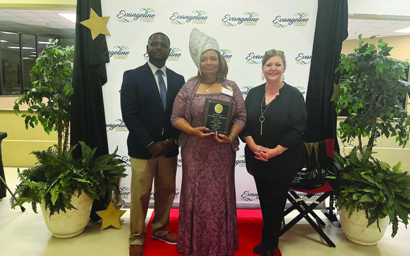 From left: Darion Arvie, Woman of the Year Grace Sibley and Connie Lamke.