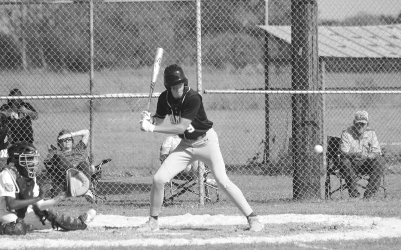 Layne Gremillion (9) waits for a pitch to cross home plate in Mamou’s 20-0 win over Ville Platte Tuesday afternoon. (Gazette photo by Tony Marks)