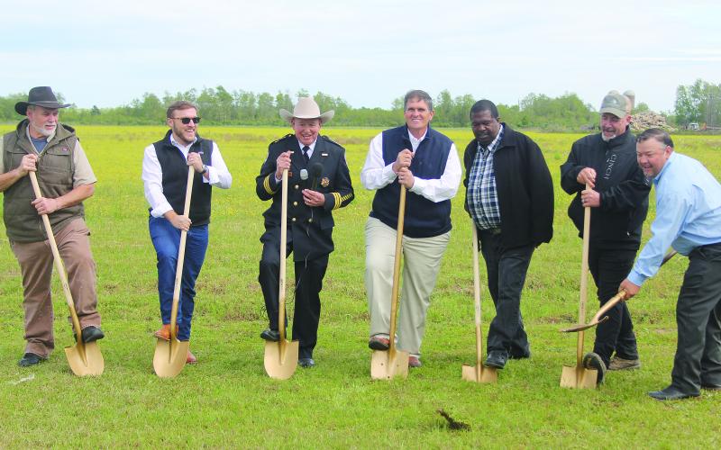 From left are Evangeline Parish Police Juror Eric Soileau, architect Alex Deshotels, Evangeline Parish Sheriff Charles Guillory, and Evangeline Parish Police Jurors Kevin Veillon, Daniel Arvie, Keith Saucier, and Bryan Vidrine as they ceremonially break ground at the site of the parish jail at the Industrial Park. (Gazette photo by Tony Marks)