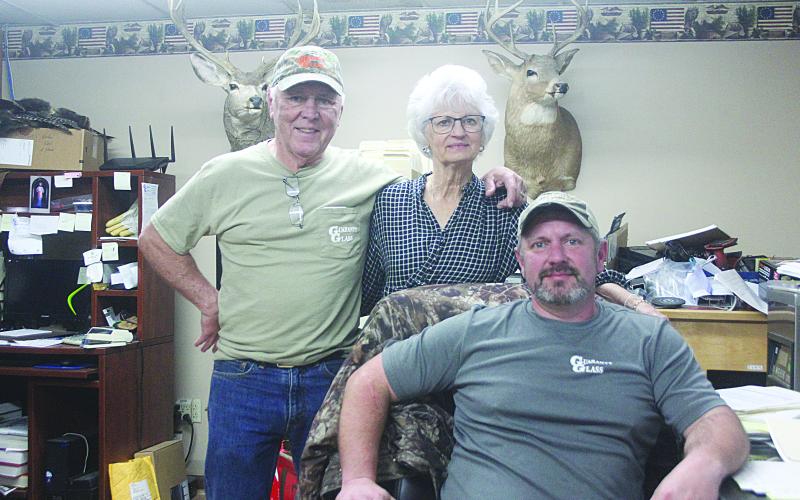 Standing from left are Richard and Carrol Lafleur, and seated is their son Chad. The three are owners of Guaranty Glass, with locations in Opelousas, Ville Platte, and Church Point. (Gazette photo by Tony Marks)