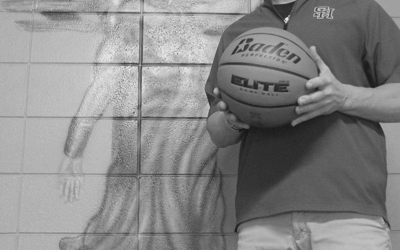 Josh Harper, head coach of the Sacred Heart Lady Trojans, was selected coach of the year. (Gazette photo by Tony Marks)