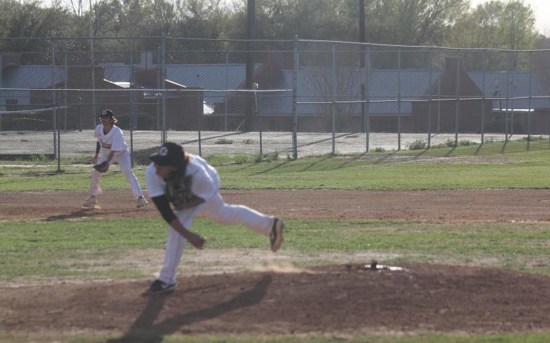 Panther pitcher Colin Ardoin (13) finishes his follow through motions after delivering a pitch earlier this season. (Gazette photo by Tony Marks)
