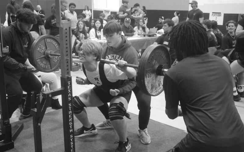 Cameron Fontenot, of Mamou, is pictured as he attempts a squat during the invitational held Saturday, January 11. He competed in the 132 weight class with a total of 685 pounds. (Gazette photo by Tony Marks)