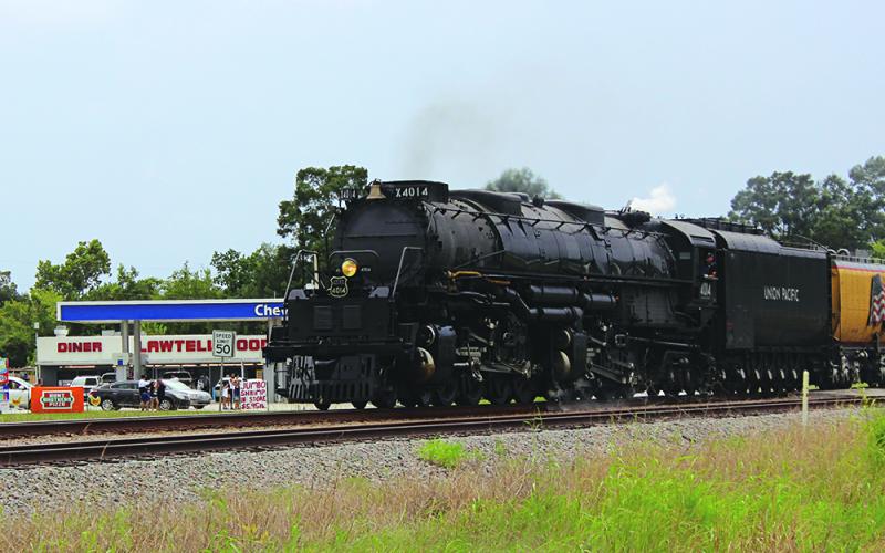 Union Pacific Big Boy No. 4014 travels along the Union Pacific railroad in Lawtell last Thursday. The train engine traveled through Louisiana as part of a 10-state tour. (Photo by Claudette Olivier/Church Point News)