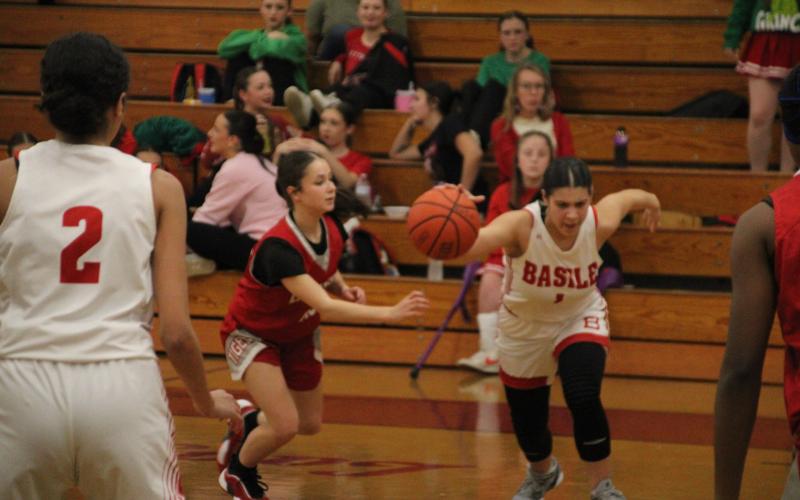 Kiyah Brown is pictured as she dribbles the ball down the court in Basile’s 50-31 win over DeQuincy at home on Tuesday night. (LSN photo by Rhett Manuel)