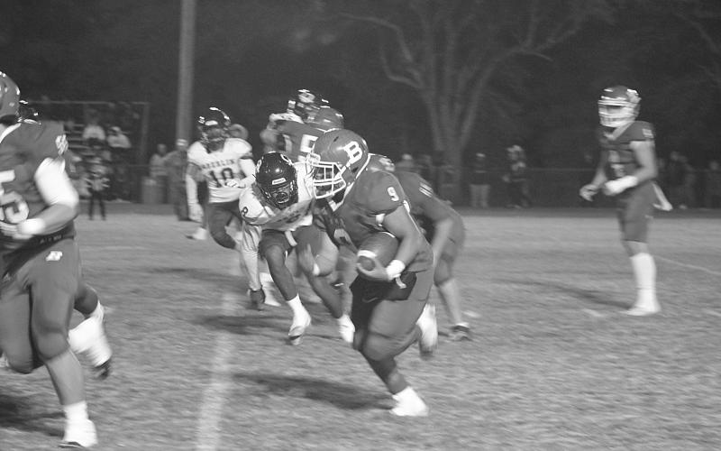 Horace Edwards Jr. finds a running lane for Basile. He and the rest of the Bearcats now host Haynesville in the quarterfinals. (Gazette photo by Sylis Manuel)
