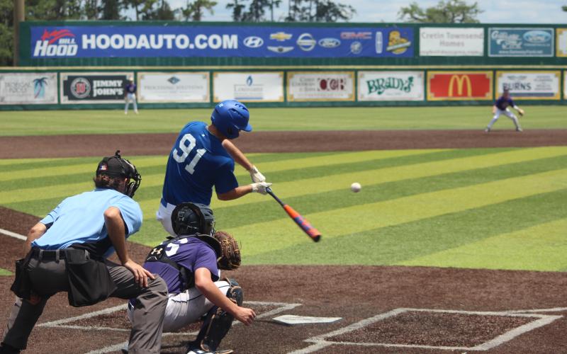 Sacred Heart pitcher and outfielder Briggs Ardoin puts the bat on the ball Tuesday morning in the LBCA Uncerclass All-State games. Ardoin was selected to the West squad. Over the two days, he pitched and played outfield.  (Gazette photo by Rhett Manuel)
