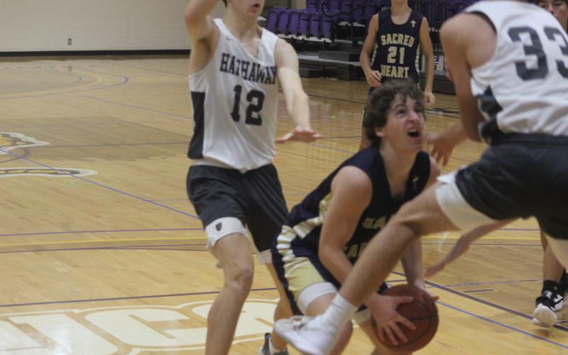 In the dog days of summer, student-athletes learn the definition of hard work and getting better without the distractions of outsiders. Despite losing this game to 46 against Hathaway, Sacred Heart athletes continuously strived to improve. (Gazette photo by Rhett Manuel)