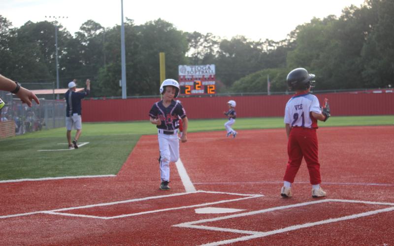Ville Platte East t-ball All-Star Levi Welch glides into home plate in a state tournament game over the weekend. Ville Platte East managed a 5-2 record in Tioga, qualifying the team to play in the upcoming World Series. (Gazette photo by Rhett Manuel)