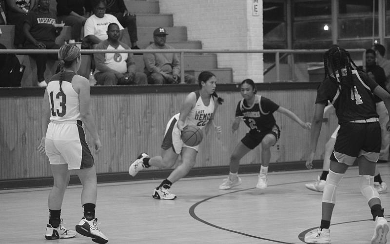 Maddie Fontenot (22) drives towards the goal in the Mamou Lady Demons’ double overtime win against Westminster at home. With the win, the team improved to 7-3 on the season. Two of the three losses came against Sacred Heart in the parish tournament. (Gazette photo by Rhett Manuel)