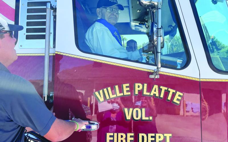 To help Alvin Soileau celebrate his birthday, members of the Ville Platte Fire Department took him for a ride in one of the fire trucks. See more photos on Page 1B. (Gazette photo by Heather Bogard)
