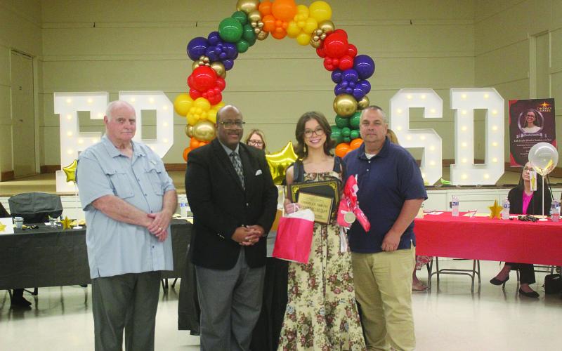 L-R: School Board President Bobby Hamlin, Superintendent Darwan Lazard, Charlee Smith, and Basile High School Principal Tony Bertrand. (Gazette photo by Tony Marks)